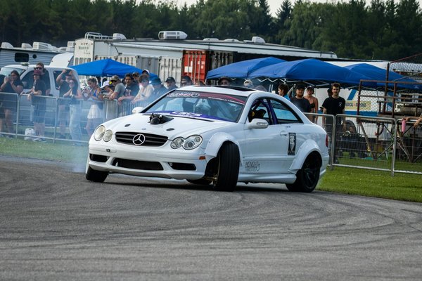 What should you keep in your car emergency kit for unexpected situations?